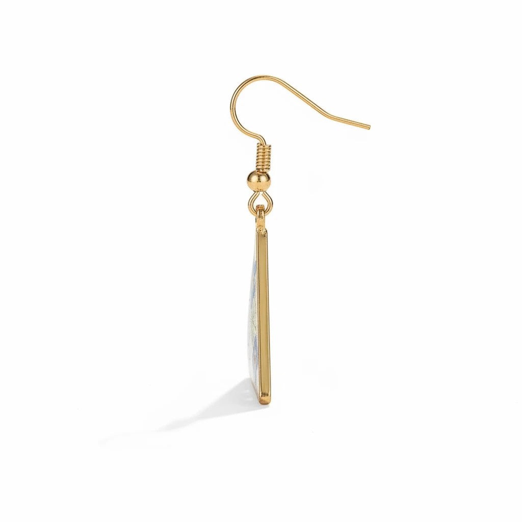 Alyssa's House triangle resin earrings featuring pressed blue forget-me-not flowers in a gold-tone frame.