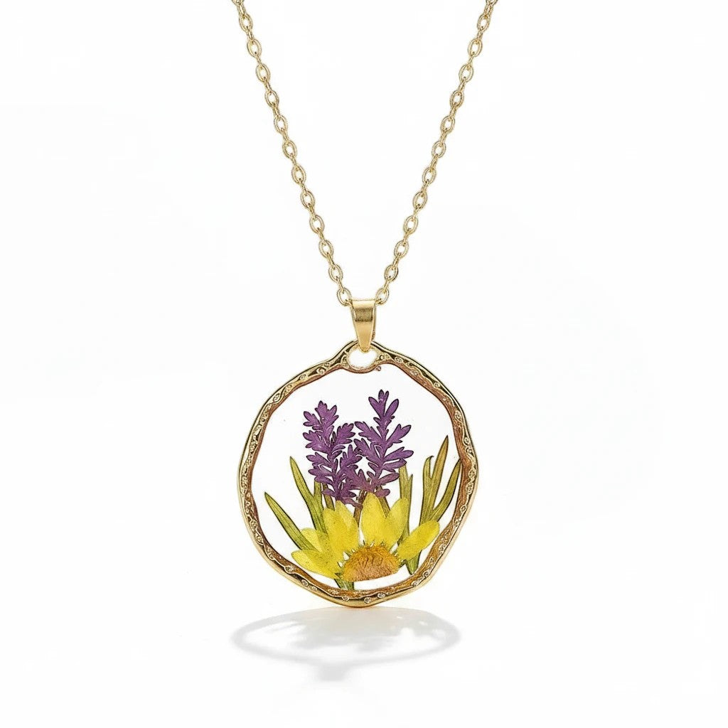 Alyssa's House round pendant necklace featuring real preserved purple lavender and yellow flowers in clear resin.